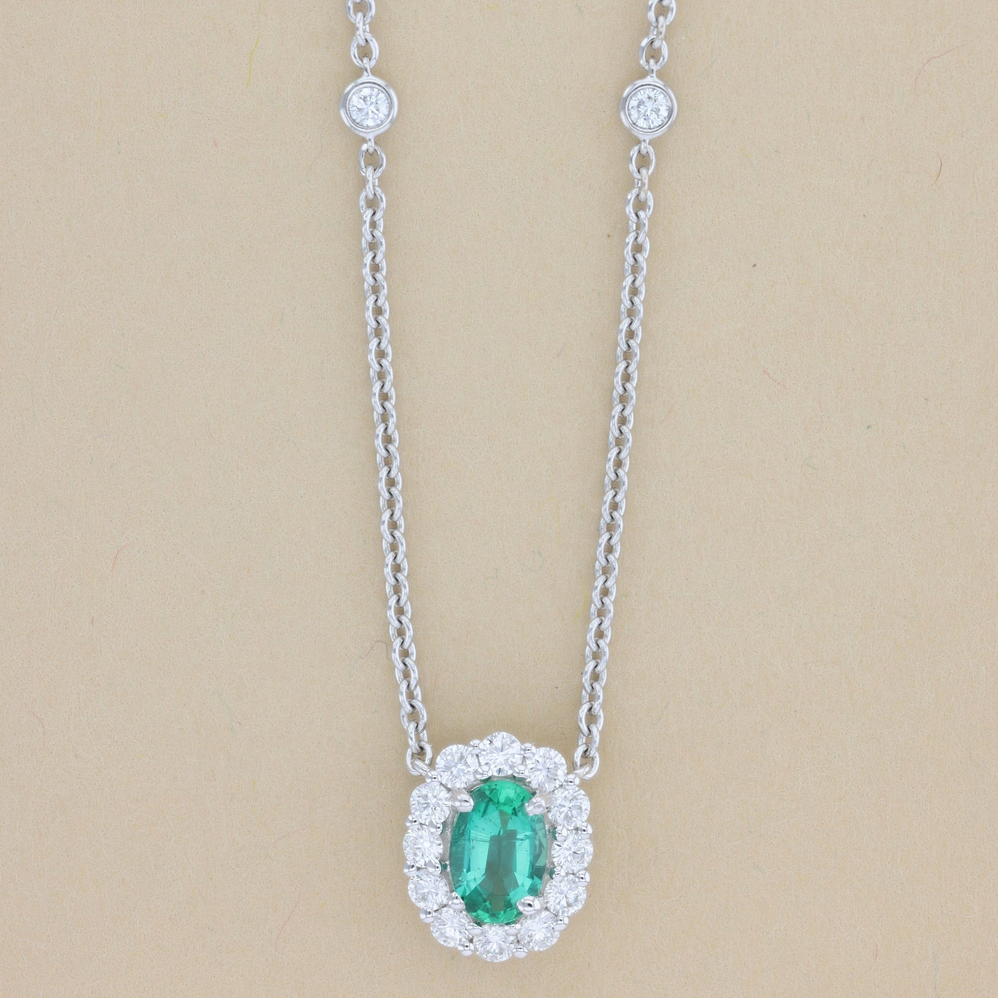 Emerald and Diamond Oval Halo Pendant Diamonds by the Yard Necklace in 18k White Gold