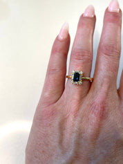 Emerald Cut Sapphire Halo Ring in 14k Yellow Gold (1 ct. tw.)