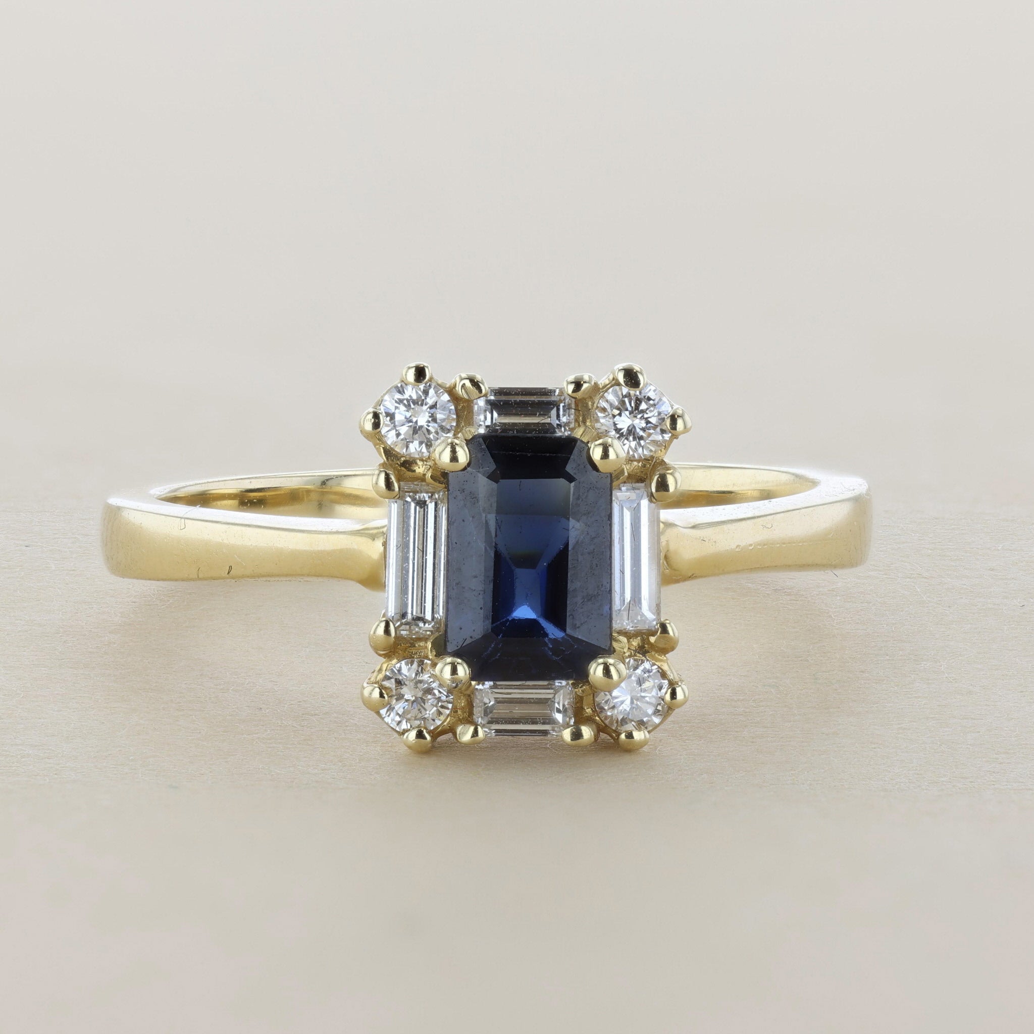 Emerald Cut Sapphire Halo Ring in 14k Yellow Gold (1 ct. tw.)