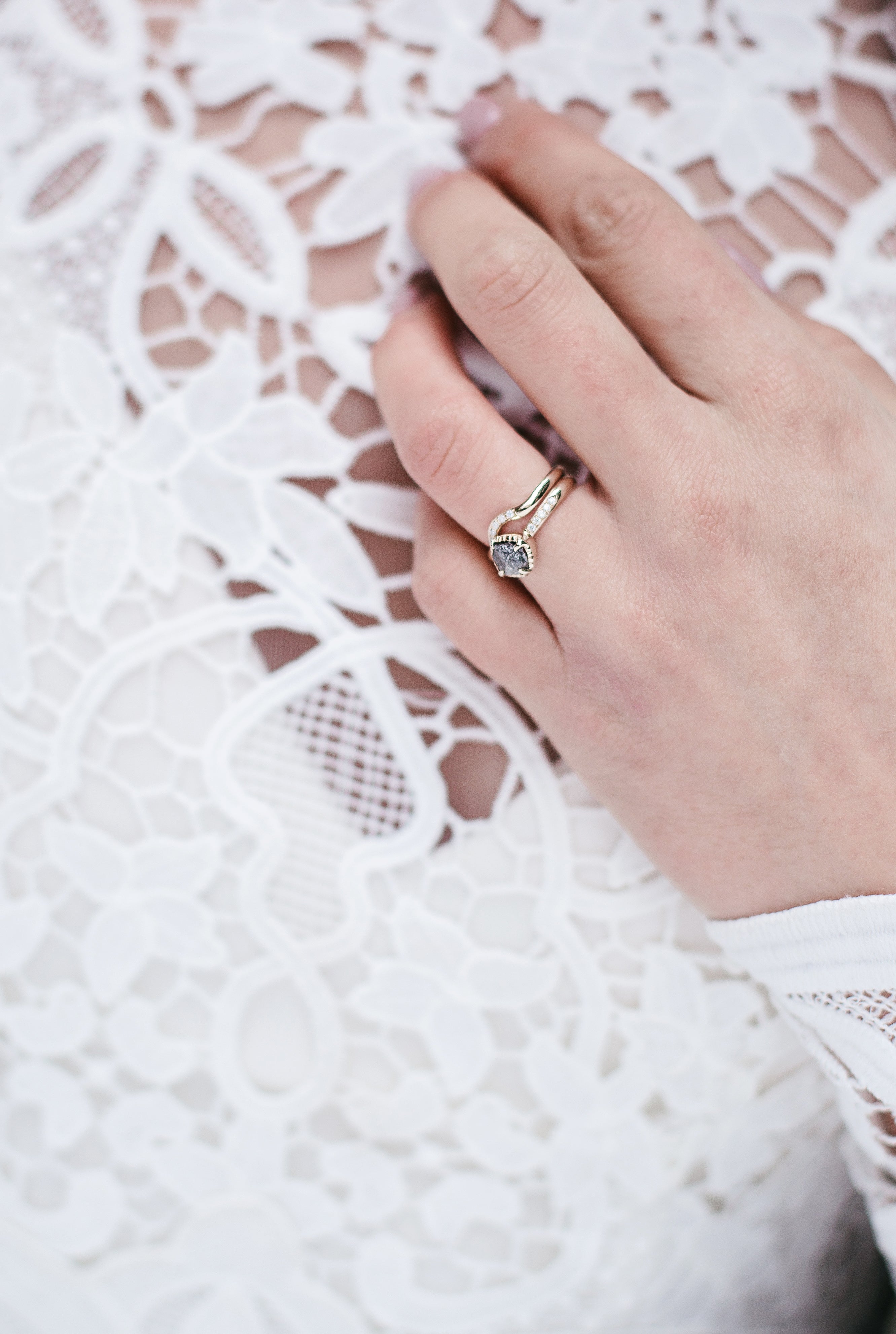 a-close-up-of-the-brides-wedding-ring-and-band.jpg